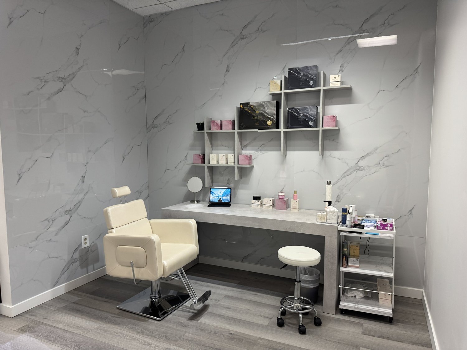 Private consultation area with modern skincare equipment